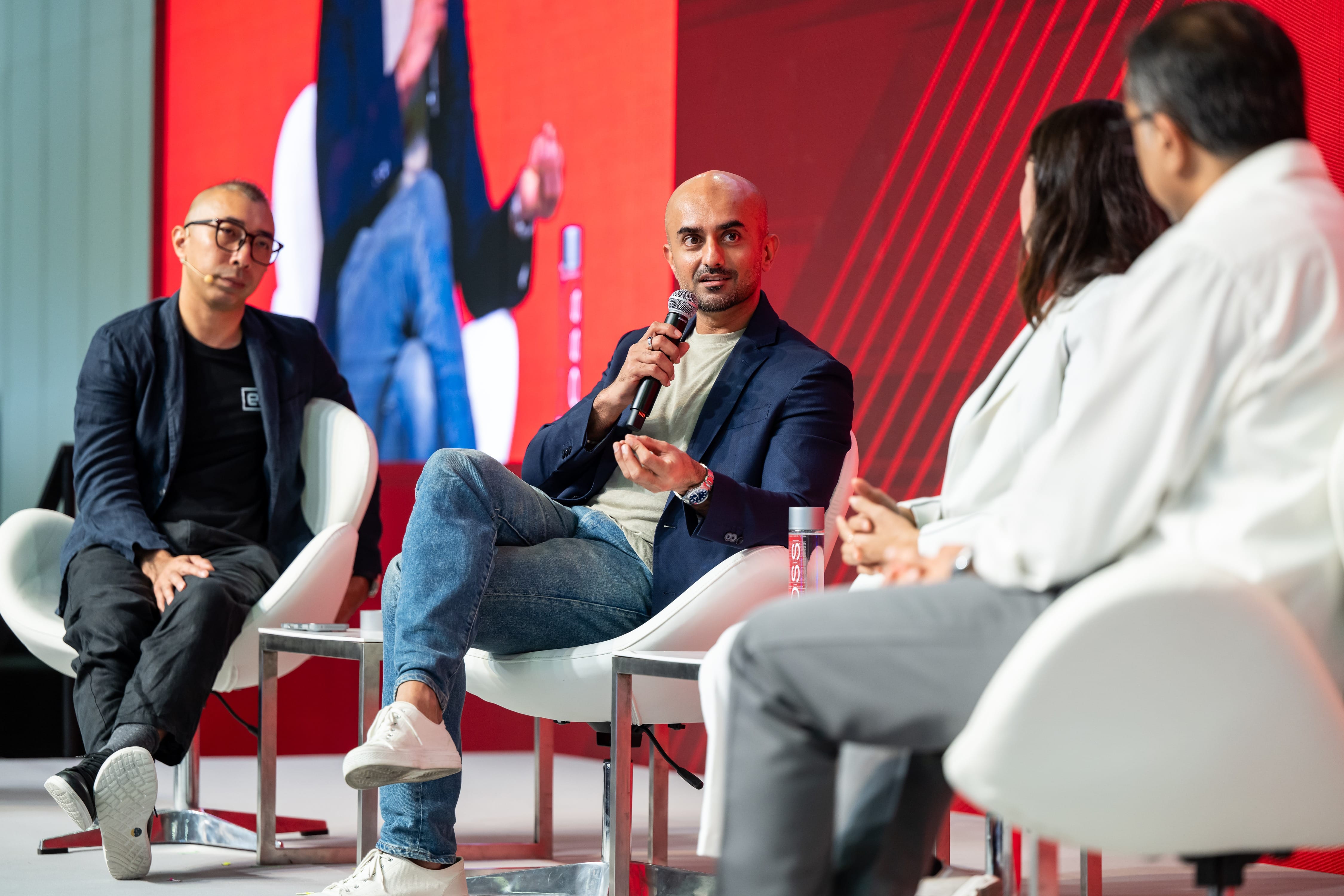 Panelists speaking at the Global Stage at SWITCH